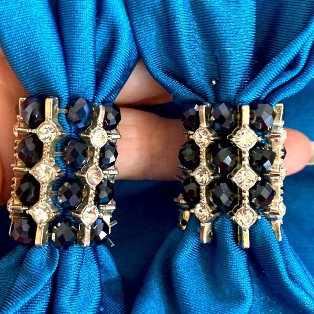 Teal bikini bottoms with jewels on each side